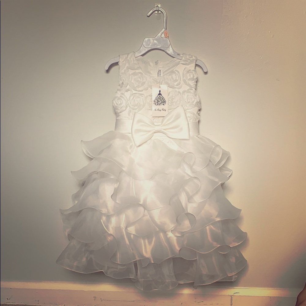 Girls formal white ruffle gown.